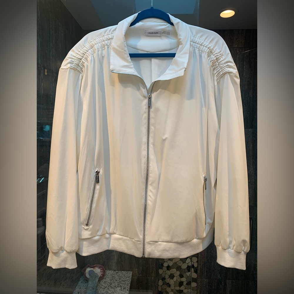 Like new! Wore once. White Calvin Klein light weight jacket.